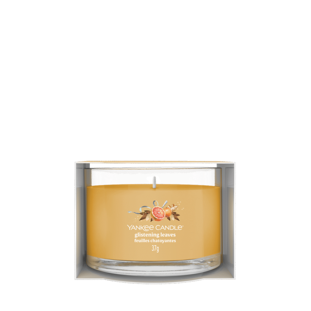 Gul doftljus i glasburk från Yankee Candle, glistening leaves, 37 g.