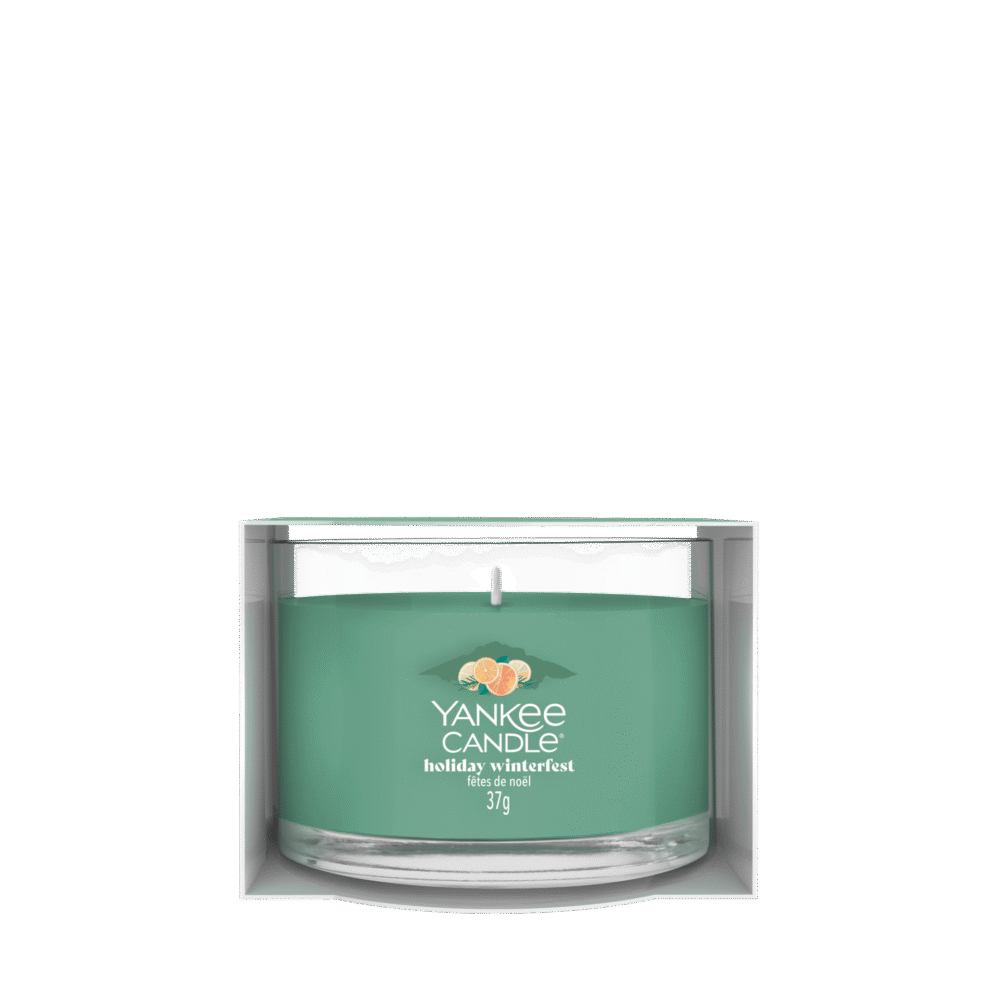 Yankee Candle Holiday Winterfest doftljus i turkos glasburk.